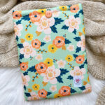 Funda Flores Fondo verde agua